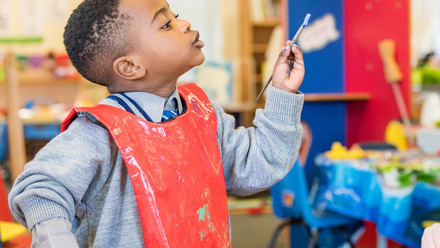 Young boy with paint brush.jpg 1