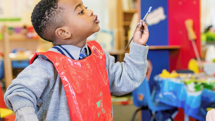 Young boy with paint brush.jpg 1