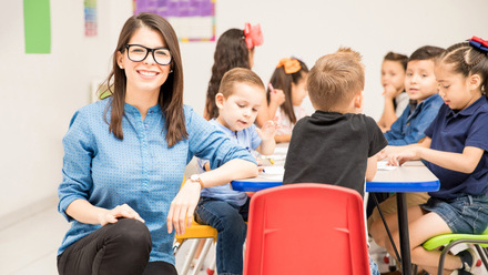 Teacher with young kids.jpg