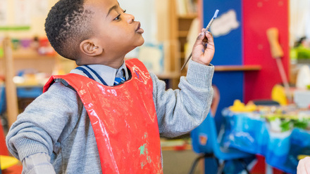 Young boy with paint brush.jpg